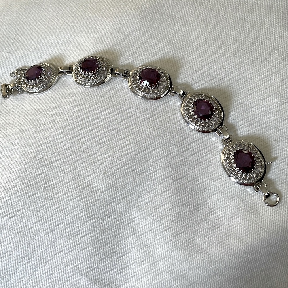 Sterling silver bracelet with faux amethyst stones. Size 6